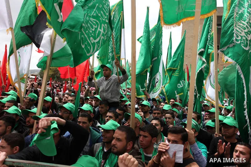 Palestinian students from Birzeit University attend the election debate between students blocs competing in the University student council elections, in the West Bank city of Ramallah on April 09, 2013. Photo by Issam Ri...