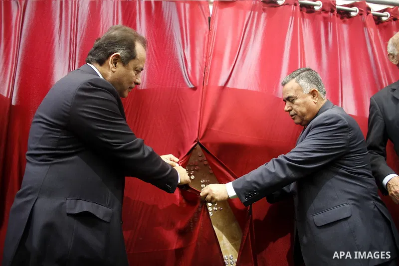 Palestinians attend the ceremony of the unveiling of the foundation stone of the new Palestinian Museum in the Bir Zeit district of the West Bank city of Ramallah on April 11, 2013. Palestinians have started the first ph...