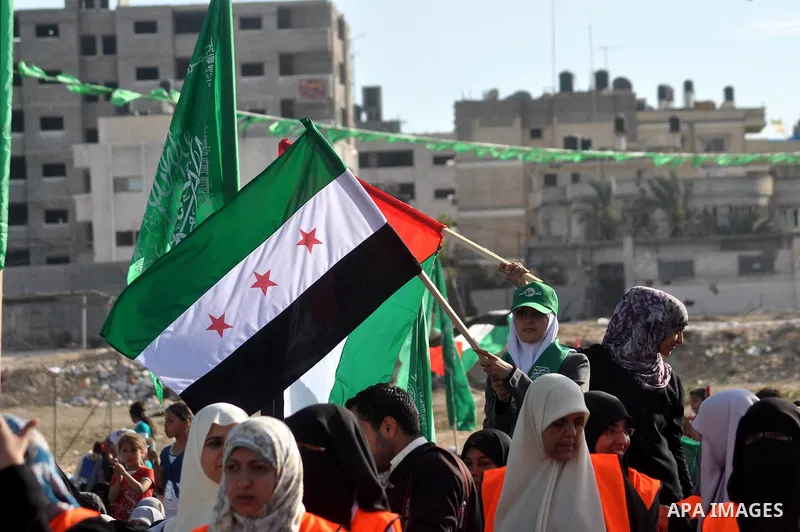 Palestinian women and children take part in a rally next to a prison in Gaza City that had been used by Israeli security services to keep Palestinian prisoners during Israel's occupation of Gaza Strip April 11, 2013. A H...