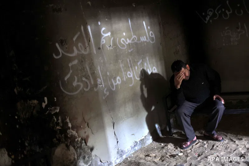 A Palestinian man sits at a cell in the prison Saraya that had been formerly been used by Israeli security, in Central Gaza City, Gaza Strip, 17 April 2013. The facility has now been turned into a memorial center with th...