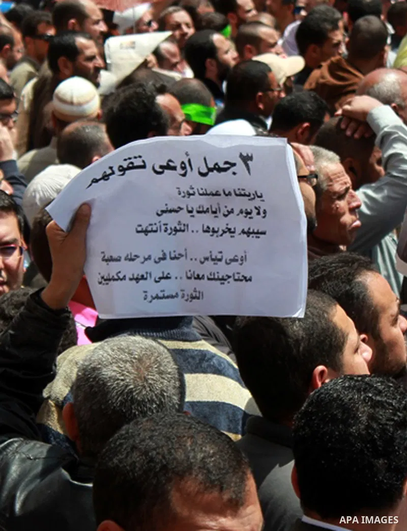 Supporters of Egyptian Muslim Brotherhood President Mohamed Morsi protest in front of the High Court in Cairo demanding a purge in the Egyptian judicial system on April 19, 2013. Photo by Tareq Gabas
