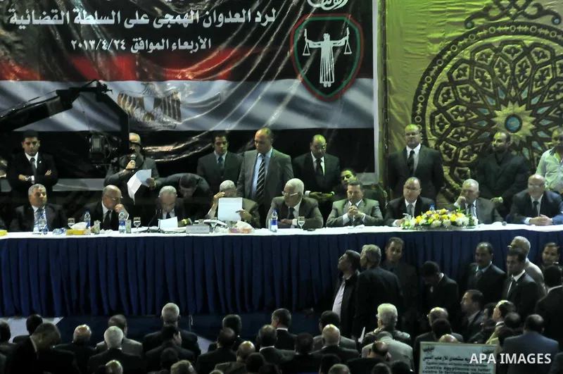 Head of the Judges Club Egypt Ahmad Al-Zend take part a meeting for the General Judges Association in Cairo in support of the Egyptian Judiciary and against the country's President Mohamed Morsi on April 24, 2013. Photo...