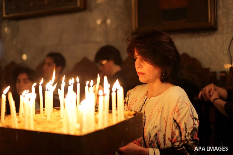 Christians attend Palm Sunday mass at the Saint Porfirios church in Gaza City on April 28, 2013. Photo by Ashraf Amra