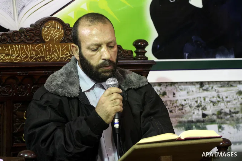 Palestinian police officers attend a holy Quran competition organised by the Interior Ministry in Gaza city on April 28, 2013. Photo by Mohammed Asad