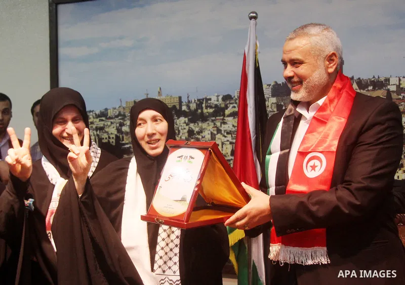Palestinian Prime Minister in Gaza strip Ismail Haniyeh meets with members of "al-Wafaa convoy" which includes activists from Turkey, Tunisia, Egypt and Europe, in Gaza city on May 02, 2013. Haniyeh emphatically rejected...