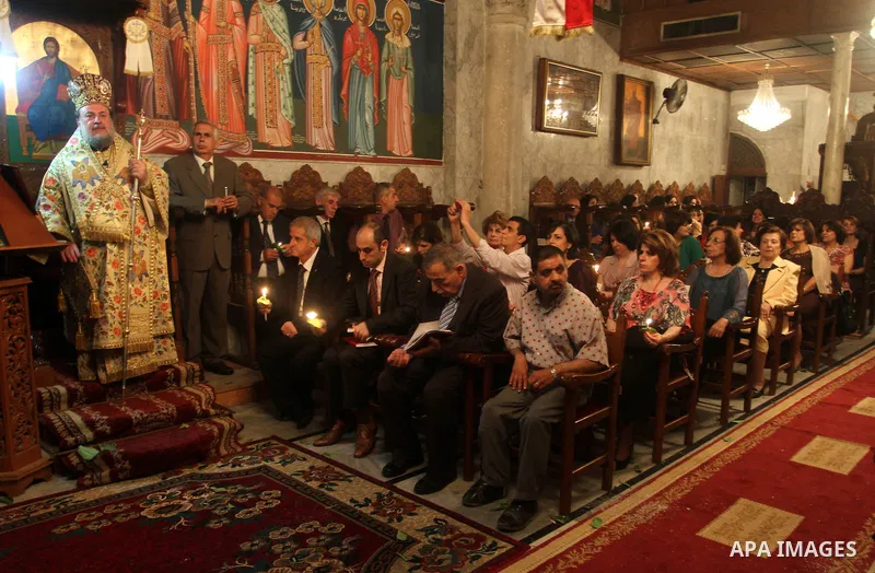 Palestinian Orthodox celebrate Holy Fire ceremony at the Saint Porfirios church in Gaza City early Gaza City May 05, 2013. Photo by Naaman Omar