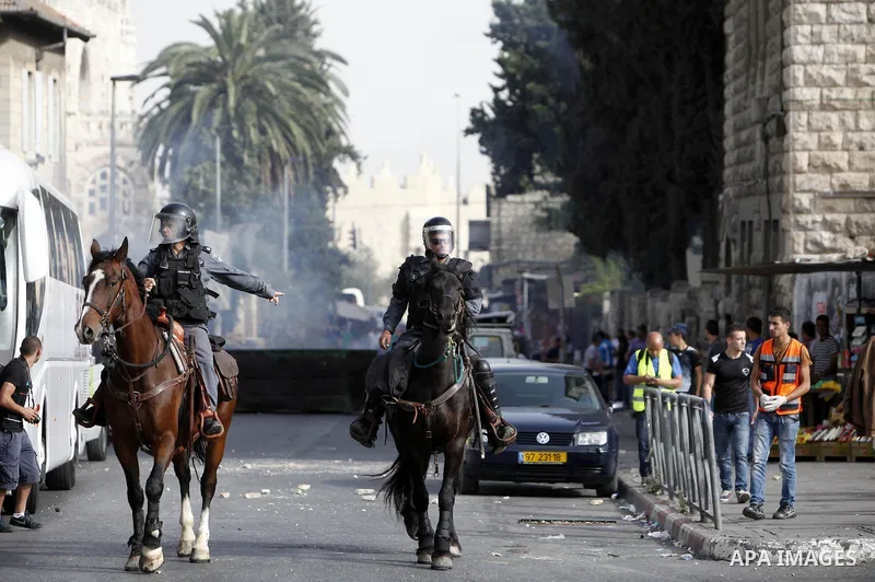 Clashes between Palestinian youths and Israeli police in Nablus Road in Jerusalem City, Protest Against the settlers stormed the Al-Aqsa Mosque and to commemorate the Nakba on May,18. 2013. Photo by Sliman Khader.
