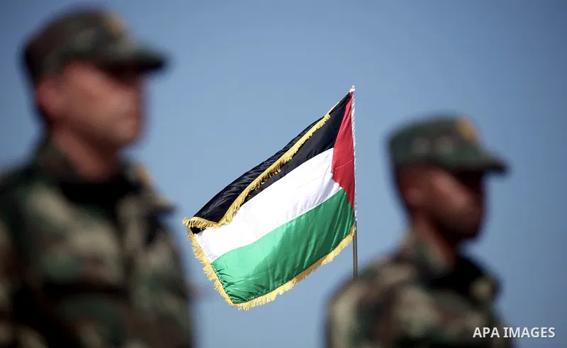 Palestinian members of national security stand during a graduation ceremony in Gaza City May 21, 2013. Photo by Ali Jadallah