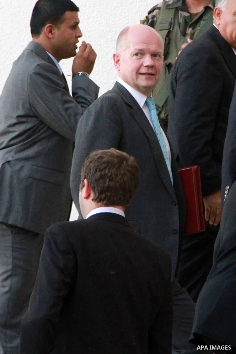 British Foreign Secretary William Hague arrives for a meeting with Palestinian President Mahmoud Abbas (unseen) in the West bank town of Ramallah, May 23, 2013. Photo by Shadi Hatem