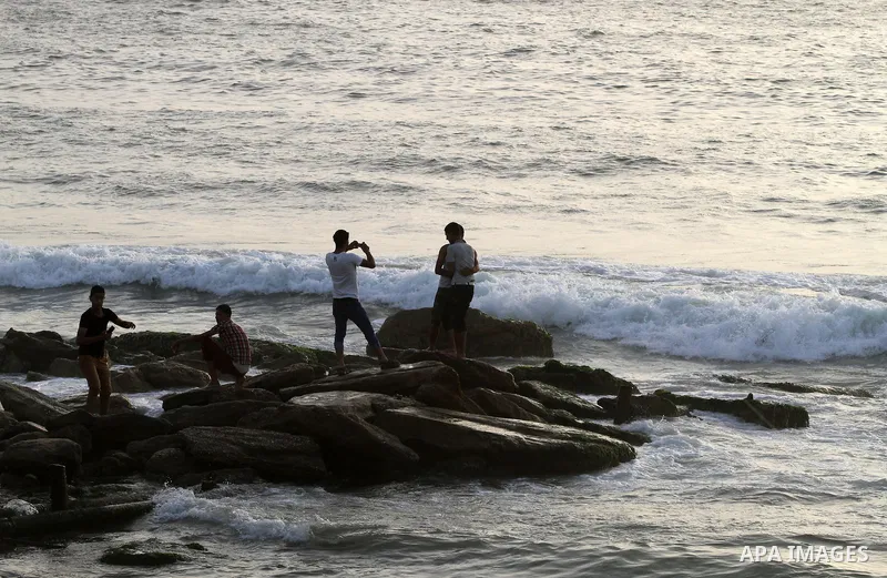 Palestinians enjoy the beach during sunny day in Gaza city on June 01, 2013. Photo by Yasser Qudeh