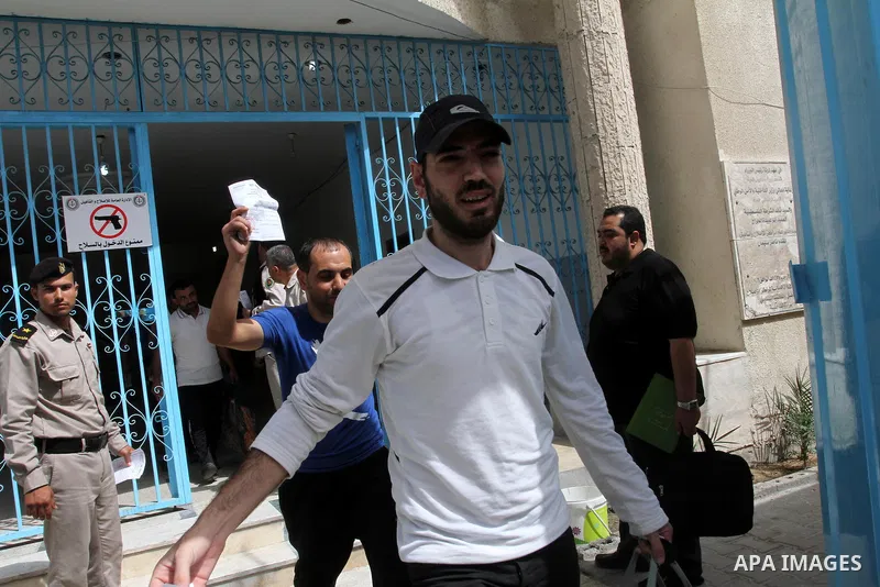 Palestinian prisoners leave the prison run by the security forces in Gaza Strip,in Gaza City on June 3, 2013. Security officials in Gaza Strip said they released 51 prisoners who spent two thirds of their sentences. Phot...