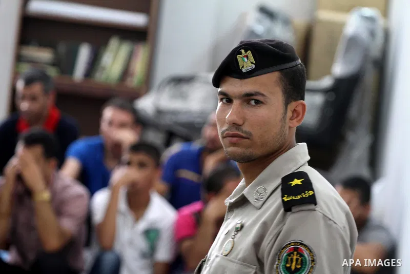 Palestinian prisoners leave the prison run by the security forces in Gaza Strip,in Gaza City on June 3, 2013. Security officials in Gaza Strip said they released 51 prisoners who spent two thirds of their sentences. Phot...