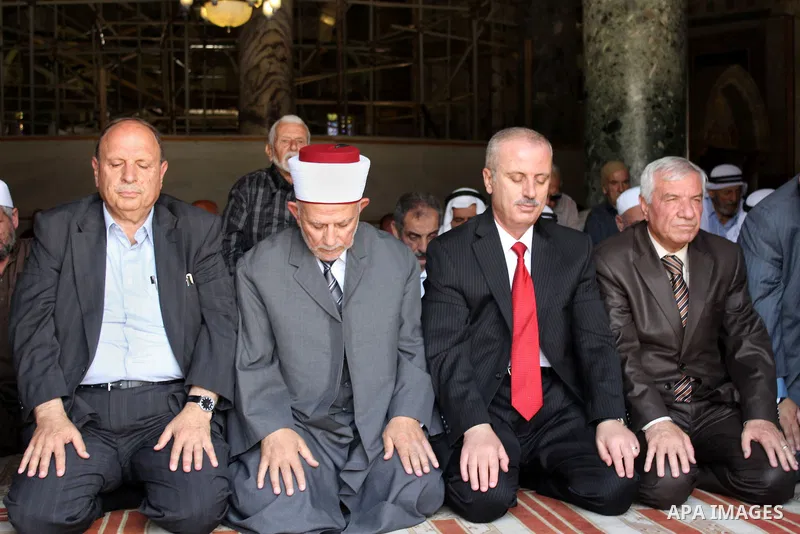 Newly appointed Palestinian Prime Minister Rami Hamdallah prays at al-Aqsa mosque during his visit to Jerusalem, June 16, 2013. Hamdallah said the PA is trying to build support for Jerusalem in Arab and international con...