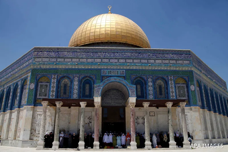 Palestinian women worshipers attend Friday prayers at al-Aqsa mosque compound, Islam's third holiest site, in Jerusalem's old city on June 21, 2013. Photo by Saeed Qaq