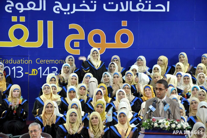 Palestinian students attend the graduation ceremony at the Islamic University, in Gaza city on June 24, 2013. The Islamic University of Gaza, also known as IUG, IU Gaza, or The University of Gaza, is an independent Pales...