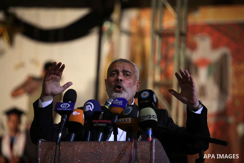 Palestinian Prime Minister in Gaza Strip Ismail Haniyeh, speaks during student graduation ceremony at the Palestine University, in Gaza city on June 27, 2013. Photo by Ashraf Amra