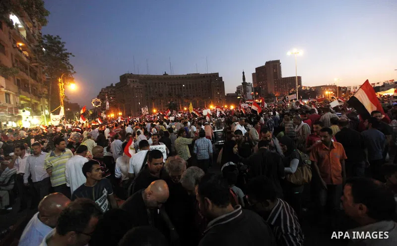 Egyptian protesters gather at Tahrir Square, the focal point of Egyptian uprising, during a protest against President Mohammed Morsi, in Cairo, Egypt, Friday, June 28, 2013. Elsewhere, thousands of supporters of Egypt's...