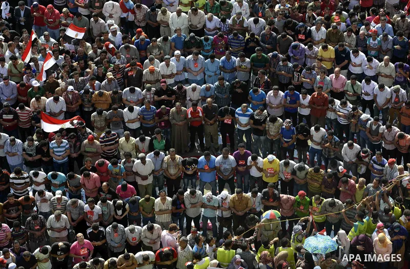 Opponents of Egypt's President Mohammed Mursi gather for noon prayers at Tahrir Square, the focal point of Egyptian uprising, in Cairo June 30, 2013. Mass demonstrations across Egypt on Sunday may determine its future, t...