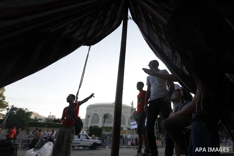 Protesters opposing Egyptian President Mohamed Mursi sleep during a sit-in protest at Tahrir Square in Cairo July 1, 2013. Egypt was locked in a tense standoff on Monday after millions of protesters swarmed into the stre...