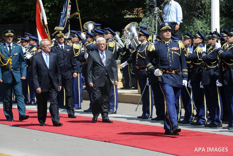 Lebanese President Michel Suleiman (2-L) review honor guards with Palestinian President Mahmud Abbas (4-L) at the Presidential palace in Baabda east of Beirut, Lebanon, 03 July 2013. Abbas arrived in Beirut for a three d...