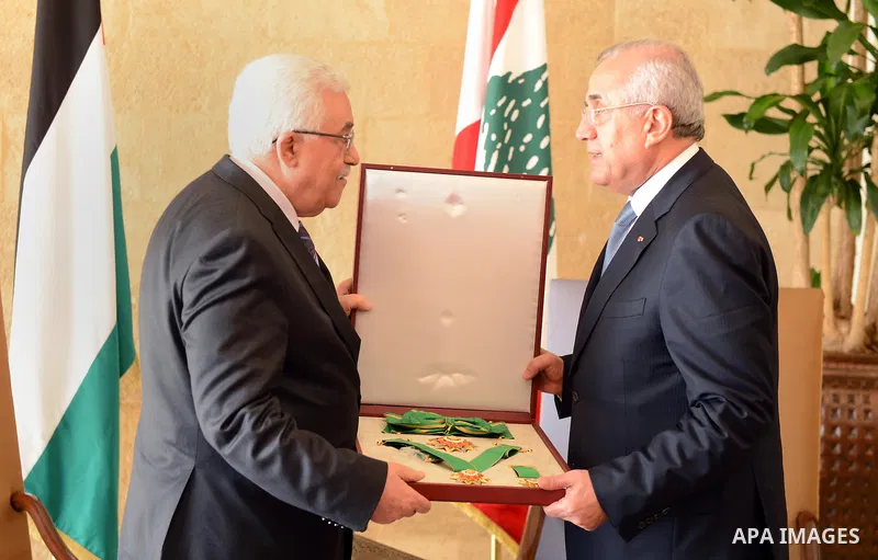 Lebanese President Michel Suleiman (R) honors Palestinian President Mahmud Abbas (L) at the Presidential palace in Baabda east of Beirut, Lebanon, 03 July 2013. Abbas flew to Lebanon via Jordan, and is expected to offer...