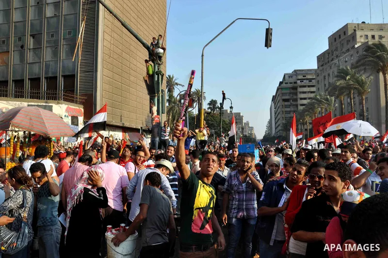 Opponents of Egypt's Islamist President Mohammed Morsi take part in a demonstration at Tahrir Square in Cairo, Egypt, Wednesday, July 3, 2013. The deadline on the military's ultimatum to President Mohammed Morsi has expi...