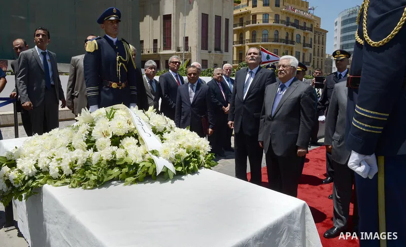 Palestinian President Mahmoud Abbas, lays a wreath at Martyrs' statue in downtown Beirut, Lebanon, Thursday, July 4, 2013. Abbas is in Beirut for three-day visit to meet with Lebanese officials. Photo by Thaer Ganaim