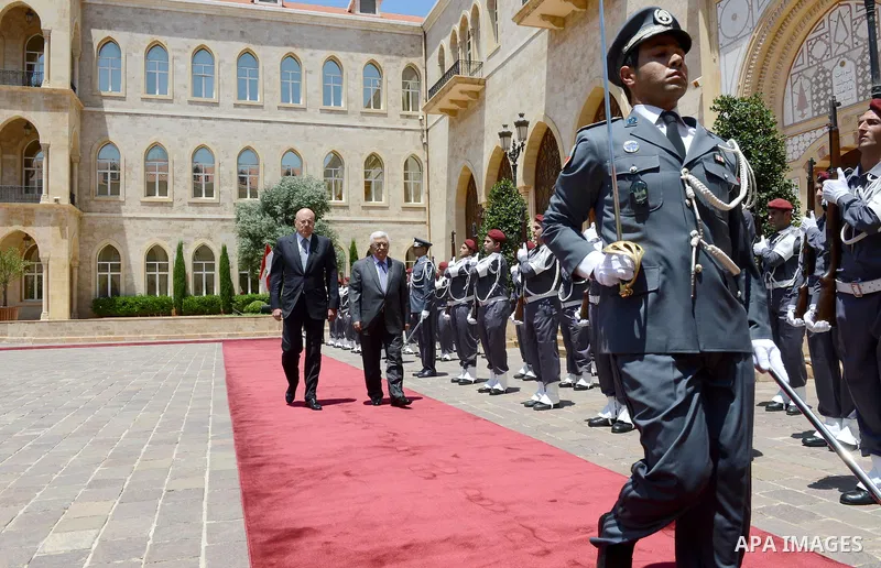 Lebanese Prime Minister Najib Mikati review honor guards with Palestinian President Mahmoud Abbas at the Government palace in Beirut, Lebanon, 04 July 2013. Abbas arrived in Beirut on 03 July for a three-day official vis...