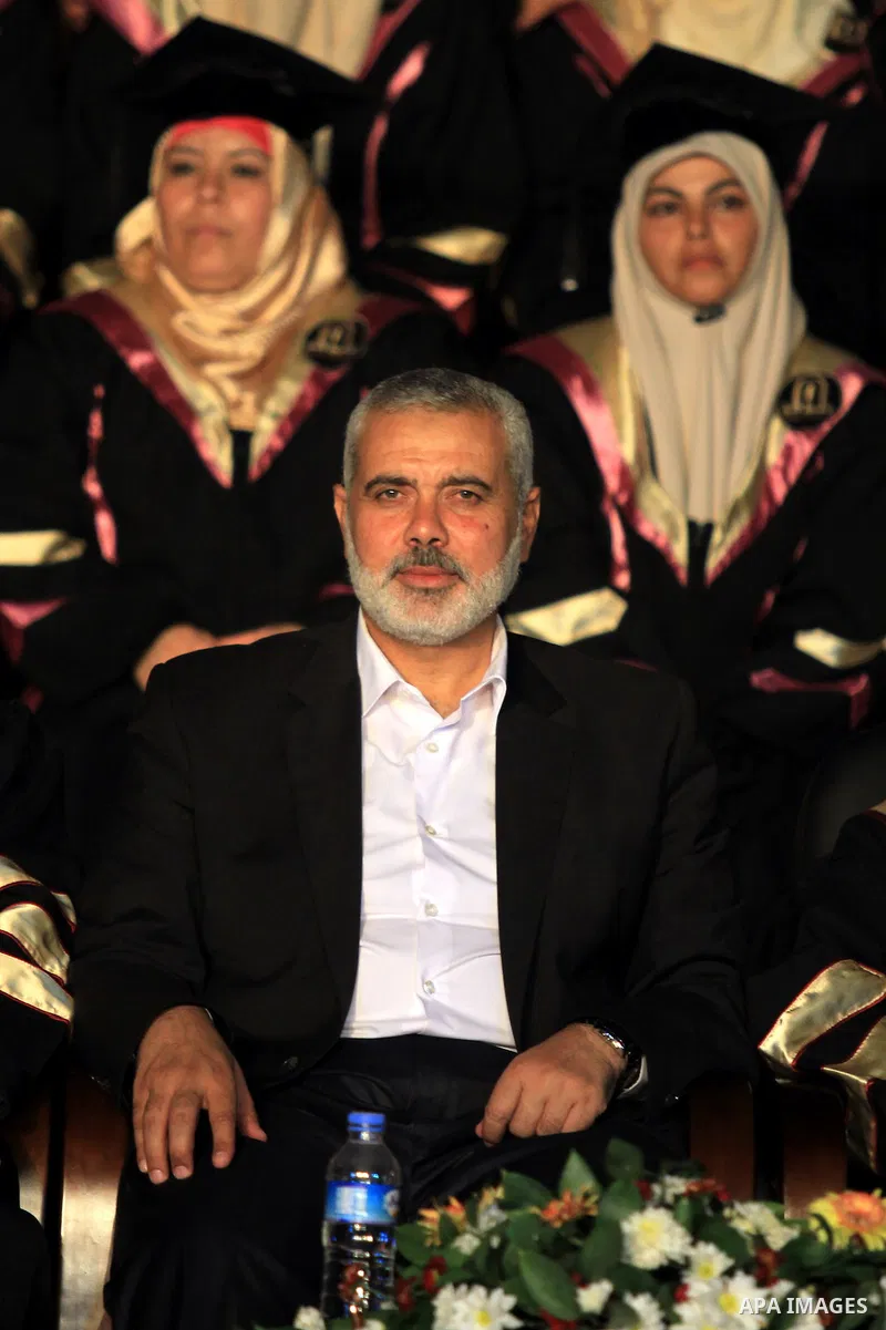 Palestinian Prime Minister in Gaza Strip Ismail Haniyeh, attends student graduation ceremony at al-Ummah University, in Gaza city on July 04, 2013. Photo by Emad Nassar