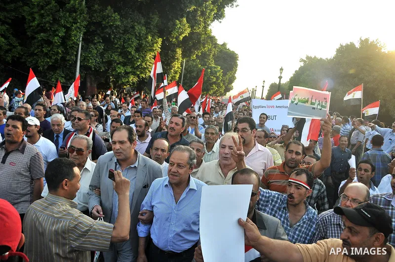 Egyptian protesters take part in a rally against US President Barack Obama in Cairo's Tahrir Square, on July 7, 2013. Opponents of Egypt's deposed Islamist president Mohamed Morsi packed Tahrir Square in their tens of th...
