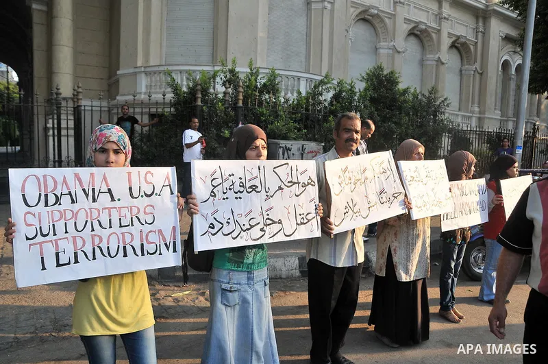 Egyptian protesters take part in a rally against US President Barack Obama in Cairo's Tahrir Square, on July 7, 2013. Opponents of Egypt's deposed Islamist president Mohamed Morsi packed Tahrir Square in their tens of th...