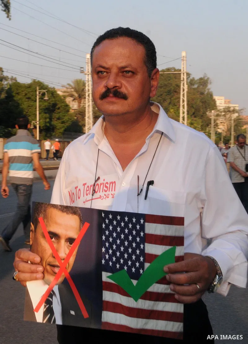 Egyptian protesters take part in a rally against US President Barack Obama in Cairo's Tahrir Square, on July 7, 2013. Opponents of Egypt's deposed Islamist president Mohamed Morsi packed Tahrir Square in their tens of th...