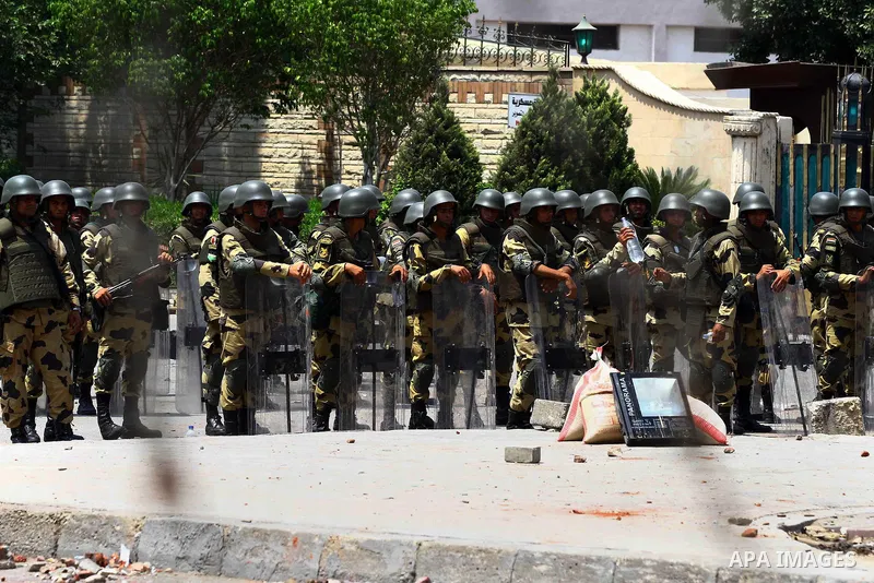 Egyptian Republican guards take position in front of their headquarter in Cairo on July 9, 2013. Egypt's armed forces warned in a statement against any attempt to disrupt the country's "difficult and complex" transition....