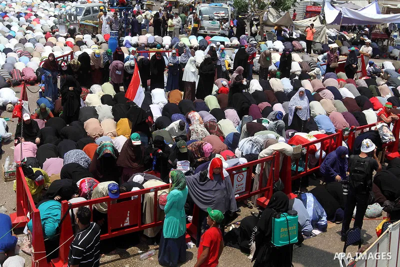Egyptian supporters of deposed president Mohamed Morsi pray during a rally in support of the former Islamist leader outside Cairo's Rabaa al-Adawiya mosque on July 9, 2013. Egypt's interim leader vowed fresh elections by...