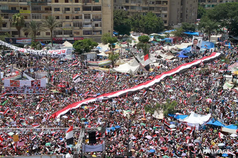 Supporters of ousted Egyptian President Mohamed Morsi take part in a protest outside Rabaa al-Adawiya mosque, after Friday prayers in Cairo, Egypt, 12 July 2013. Backers and opponents of Morsi were to hold rival rallies...