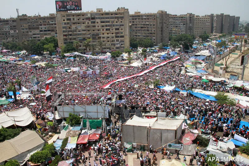 Supporters of ousted Egyptian President Mohamed Morsi take part in a protest outside Rabaa al-Adawiya mosque, after Friday prayers in Cairo, Egypt, 12 July 2013. Backers and opponents of Morsi were to hold rival rallies...