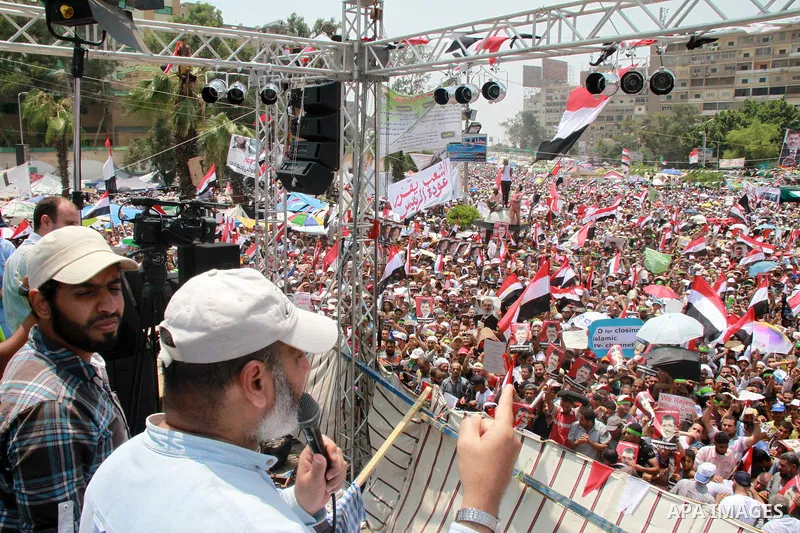 Supporters of ousted Egyptian President Mohamed Morsi take part in a protest outside Rabaa al-Adawiya mosque, after Friday prayers in Cairo, Egypt, 12 July 2013. Backers and opponents of Morsi were to hold rival rallies...