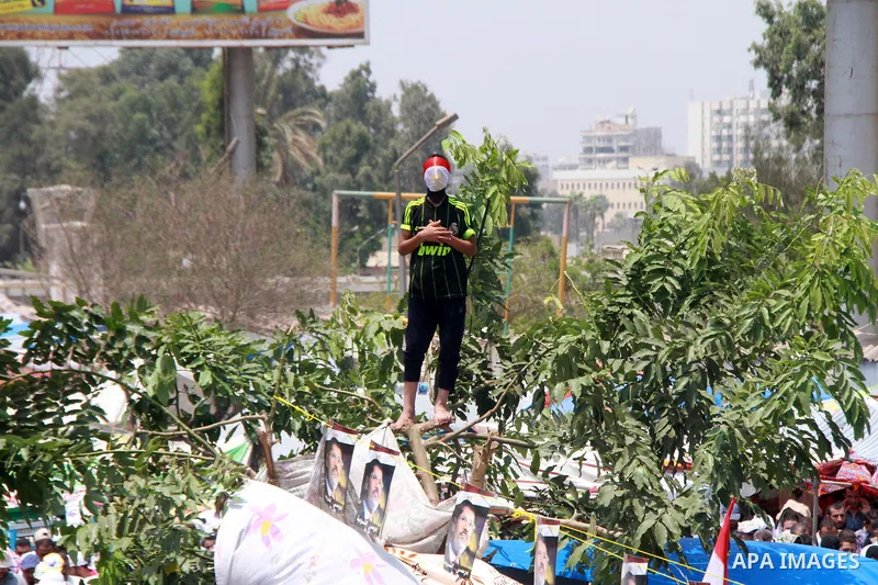 Supporters of ousted Egyptian President Mohamed Morsi take part in a protest outside Rabaa al-Adawiya mosque, after Friday prayers in Cairo, Egypt, 12 July 2013. Backers and opponents of Morsi were to hold rival rallies...