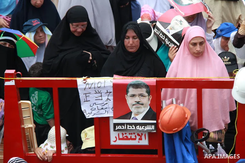 Supporters of ousted Egyptian President Mohamed Morsi perform Friday prayer during a protest outside Rabaa al-Adawiya mosque, after Friday prayers in Cairo, Egypt, 12 July 2013. Backers and opponents of Morsi were to hol...
