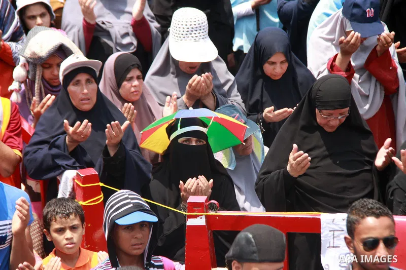 Supporters of ousted Egyptian President Mohamed Morsi perform Friday prayer during a protest outside Rabaa al-Adawiya mosque, after Friday prayers in Cairo, Egypt, 12 July 2013. Backers and opponents of Morsi were to hol...