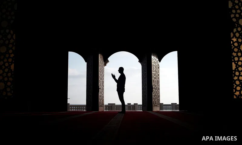 A Palestinian man reads from the Koran in a mosque during the holy month of Ramadan in Gaza City, Gaza Strip, 12 July 2013. Muslims around the world are observing the holy fasting month of Ramadan in which they refrain f...