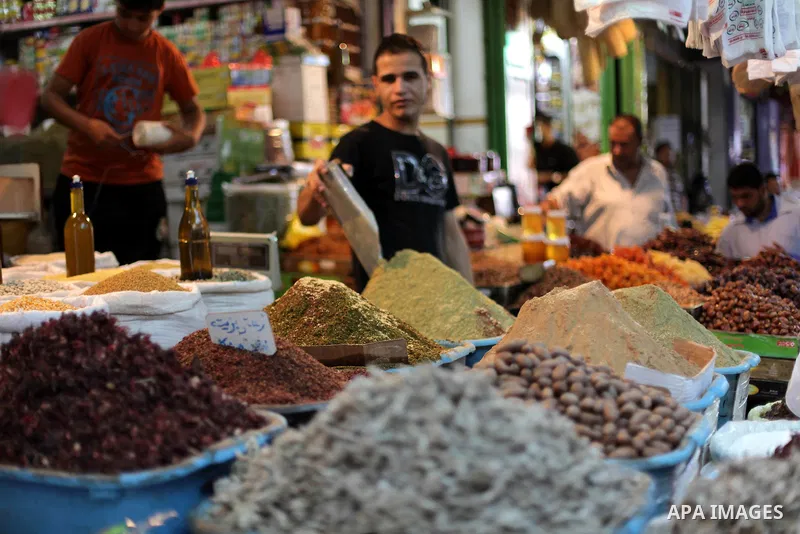A Palestinian vendor sells spices the fourth day of the Muslim fasting month of Ramadan on July 13, 2013 in Gaza city. During Ramadan, one of the five main religious obligations under Islam, Muslims are required to absta...