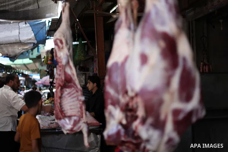 A Palestinian vendor sells meats the fourth day of the Muslim fasting month of Ramadan on July 13, 2013 in Gaza city. During Ramadan, one of the five main religious obligations under Islam, Muslims are required to abstai...