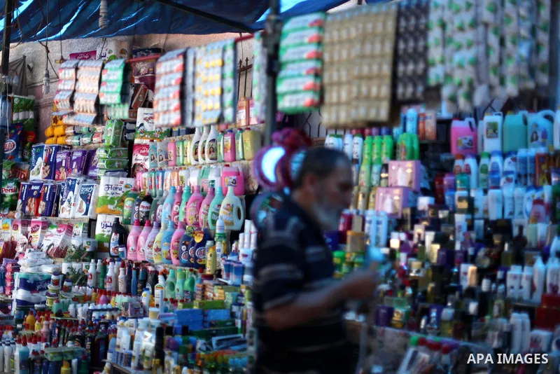 A Palestinian vendor sells goods the fourth day of the Muslim fasting month of Ramadan on July 13, 2013 in Gaza city. During Ramadan, one of the five main religious obligations under Islam, Muslims are required to abstai...