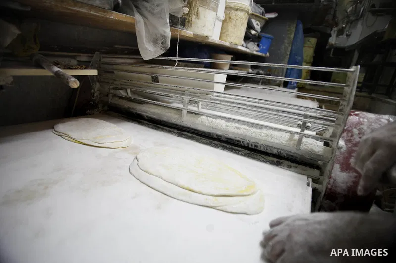 A Palestinian man prepares traditional sweets "Baklava" during the fourth day of the holy fasting month of Ramadan, in Jerusalem old city, on July 13, 2013. Muslims around the world are observing the holy fasting month o...