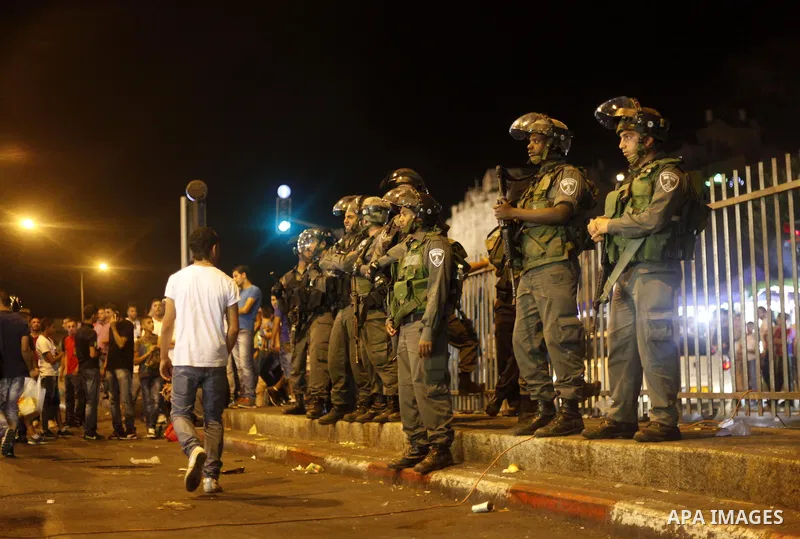 Armed Israeli border police patrols near the scene where allegedly two Palestinians stabbed an ultra-Orthodox Jew at the Damascus Gate in the Old City of Jerusalem, 16 July 2013 evening. The victim reportedly was wounded...