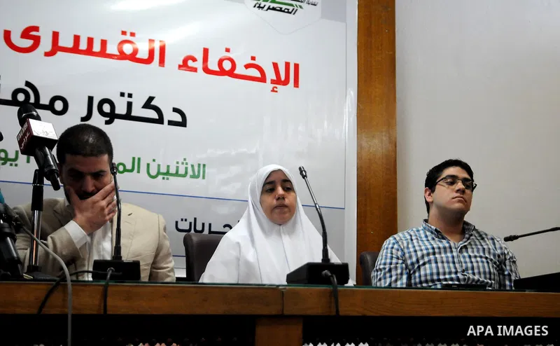 Shima, Osama and Abdullah Mohamed Mursi, the sons and daughter of Egypt's ousted president Mohamed Mursi attend a news conference in Cairo July 22, 2013. The family of ousted Egyptian President Mohamed Mursi said on Mond...