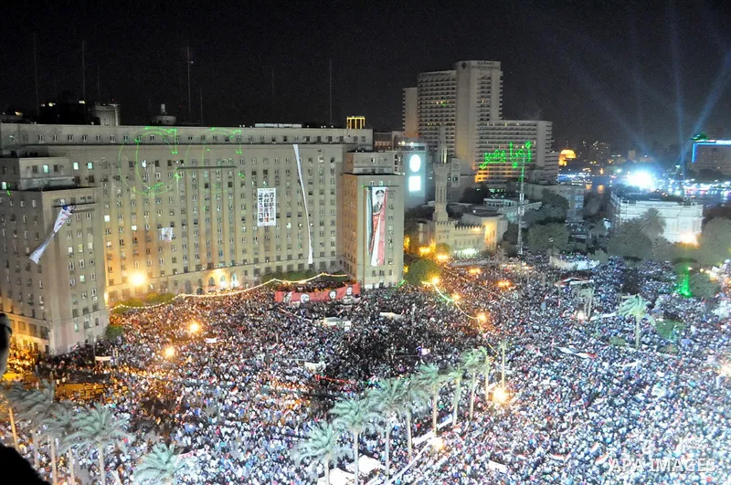 Egyptian opponents of ousted president Mohamed Morsi gather at Tahrir Square in Cairo, Egypt, 26 July 2013. Egyptian authorities on 26 July ordered ousted president Mohammed Morsi to be detained for 15 days pending furth...