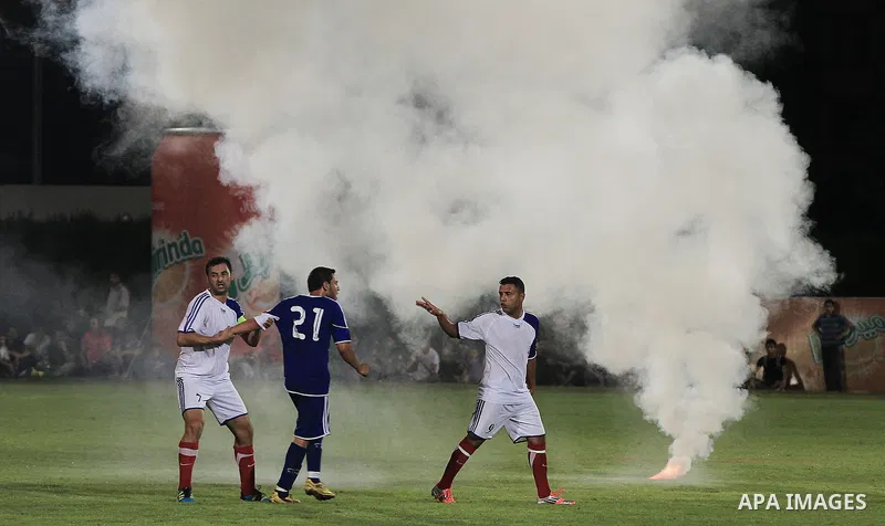 Palestinian soccer teams from Gaza City's al-Shati Services football club compete for the Pepsi cup league against Rafah Youth Club in Al-Yarmouk Stadium in Gaza City on July 29, 2013. al-Shati Services club beat off Raf...