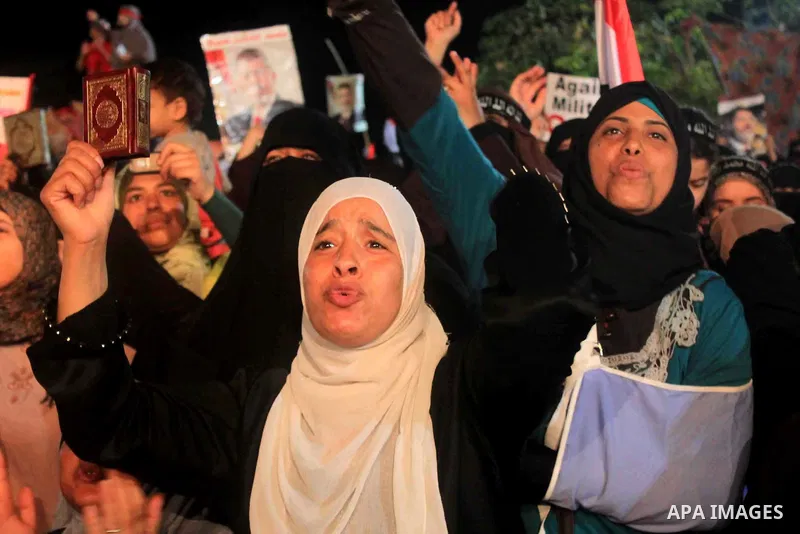 Supporters of Egypt's ousted President Mohammed Morsi chant slogans during a protest outside Rabaa al-Adawiya mosque, where they have installed a camp and hold daily rallies at Nasr City, in Cairo, Egypt, Wednesday, July...